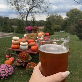 Inverness Brewing - a person holding a glass of beer - Breweries Near Me - Monkton, Maryland