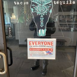 Sign ont he front door Sign ont he front door