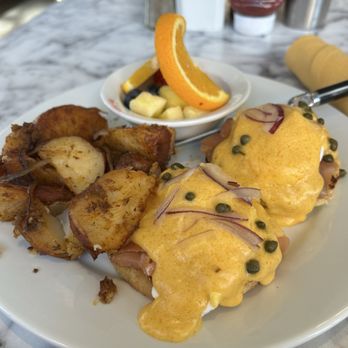 Immigrant Son Caffe - Smoked Salmon Benedict with breakfast potatoes, and seasoned fruit - Breakfast & Brunch Near Me - Oxnard, California