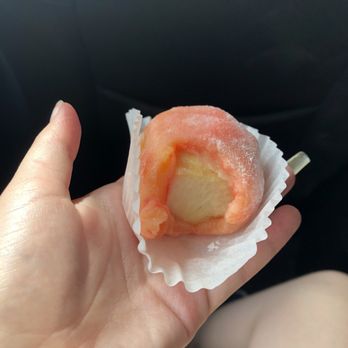 Two Ladies Kitchen - Inside of the Saturn peach mochi (the fruit was quite hard and unusually not sweet or juicy) - Bakeries Near Me - Hilo, Hawaii Two Ladies Kitchen - Inside of the Saturn peach mochi (the fruit was quite hard and unusually not sweet or juicy) - Bakeries Near Me - Hilo, Hawaii