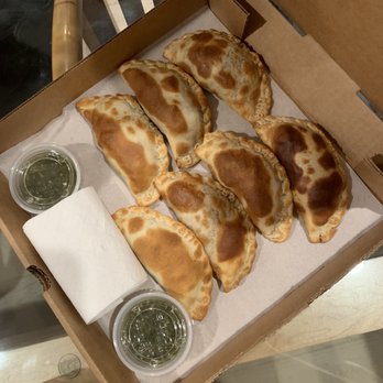 5411 Empanadas - Assorted empanadas with chimichurri - Latin American Near Me - Houston, Texas
