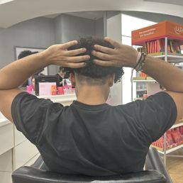 The hack job performed by a "licensed" cosmetologist. The hack job performed by a "licensed" cosmetologist.