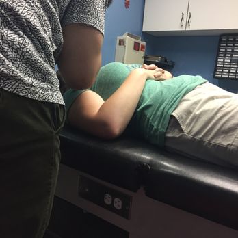 Infinite Body Piercing - Shot of Robert and one of the piercing rooms (plus me on the table). - Piercing Near Me - Philadelphia, Pennsylvania