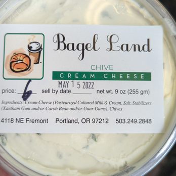 Bagel Land - a hand holding a container of bagel land cheese - Bakeries Near Me - Portland, Oregon Bagel Land - a hand holding a container of bagel land cheese - Bakeries Near Me - Portland, Oregon