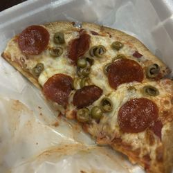 Northside Sports Page - This is 1/2 my 10" thin crust pizza. 2 toppings $6.50 and so yummy. Loaded with cheese.