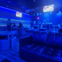 Harold's Chicken & Ice Bar - Marietta - Lounge area near the stage. The dj set up is on the stage