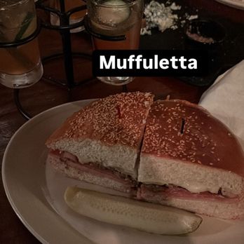 Napoleon House - Italian Muffuletta Ham, Genoa Salami, Pastrami, Swiss and Provolone Cheese, Housemade Italian Olive Salad - American Near Me - New Orleans, Louisiana Napoleon House - Italian Muffuletta Ham, Genoa Salami, Pastrami, Swiss and Provolone Cheese, Housemade Italian Olive Salad - American Near Me - New Orleans, Louisiana