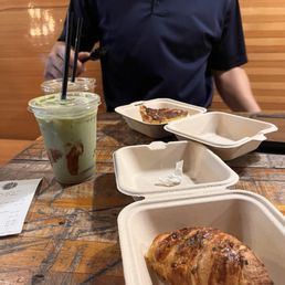 Iced strawberry matcha, iced lavender latte, quiche, and the ham and cheese croissant