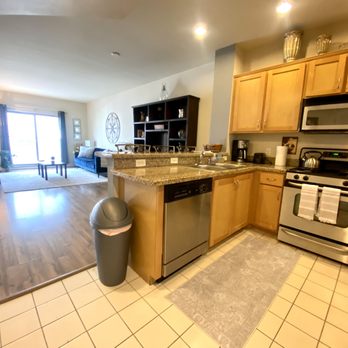 Allure Services - a kitchen and living room - Home Cleaning Near Me - San Diego, California Allure Services - a kitchen and living room - Home Cleaning Near Me - San Diego, California