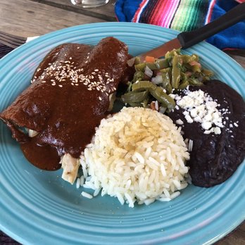 Cascabel Mexican Patio - Enmoladas: chicken enchiladas with mole sauce. Black beans, rice, and nopal salad. - Mexican Near Me - San Antonio, Texas