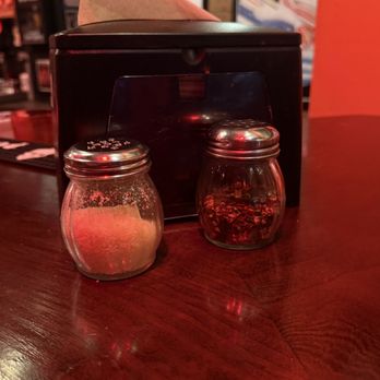 The Headless Bat - Napkins, Crushed Red Pepper and Parmesan Cheese - Pizza Near Me - St. Louis, Missouri The Headless Bat - Napkins, Crushed Red Pepper and Parmesan Cheese - Pizza Near Me - St. Louis, Missouri