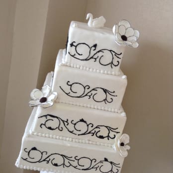 The Cupcake Shop - They also make wedding cakes. This cake is on display at the Cupcake Shop - Cupcakes Near Me - Enid, Oklahoma The Cupcake Shop - They also make wedding cakes. This cake is on display at the Cupcake Shop - Cupcakes Near Me - Enid, Oklahoma