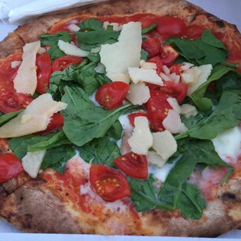 Gusta Pizza - Gusta Pizza - tomato sauce, mozzarella, cherry tomatoes, arugula, and parmesan. - Italian Near Me - Florence, FI