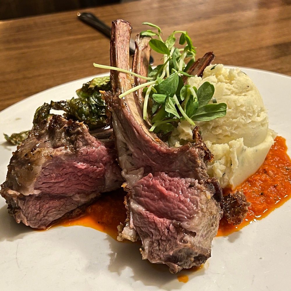 Gustav Chophouse - a plate of food with mashed potatoes and greens - Steakhouses Near Me - Collingwood, Ontario