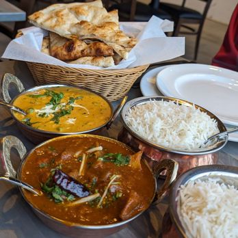 Oh Bombay - a variety of indian dishes on a table - Indian Near Me - Richmond Hill, Ontario