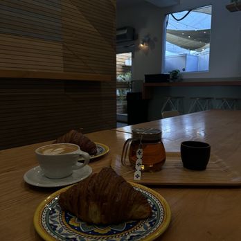 Alana’s Coffee Roasters - Croissant, Latte, and Mint Bruce Lee Tea - Coffee & Tea Near Me - West Hollywood, California Alana’s Coffee Roasters - Croissant, Latte, and Mint Bruce Lee Tea - Coffee & Tea Near Me - West Hollywood, California
