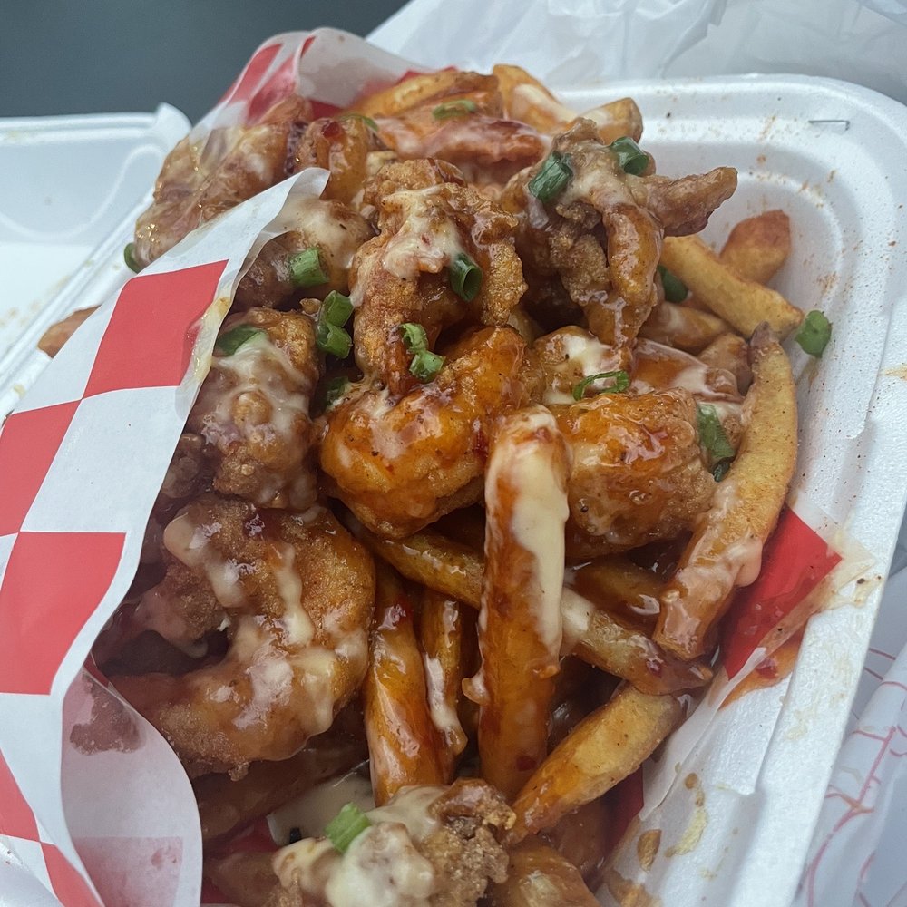 Shrimp and lobster bites with fries Shrimp and lobster bites with fries