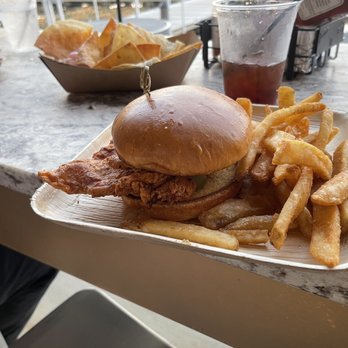 The Anchor - Chicken sandwich with fries - Cocktail Bars Near Me - Madisonville, Louisiana The Anchor - Chicken sandwich with fries - Cocktail Bars Near Me - Madisonville, Louisiana