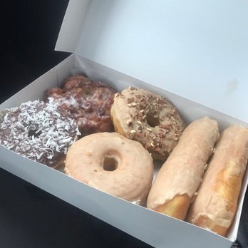 OMG Donuts & Bakery - So much maple, apple fritter (ooh la la) and a chocolate frosted with coconut. - Donuts Near Me - Concord, North Carolina OMG Donuts & Bakery - So much maple, apple fritter (ooh la la) and a chocolate frosted with coconut. - Donuts Near Me - Concord, North Carolina
