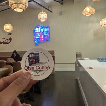 Qisa Coffee - Qisa sticker + inside - Coffee & Tea Near Me - Sacramento, California Qisa Coffee - Qisa sticker + inside - Coffee & Tea Near Me - Sacramento, California
