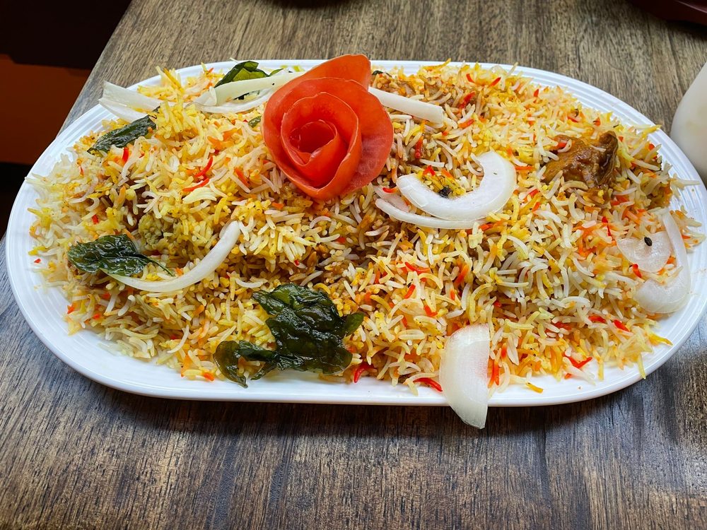 Maharaj Restaurant and Banquets Logo