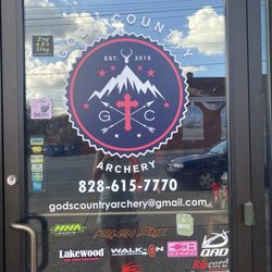 God’s Country Archery - Front door with contact information.