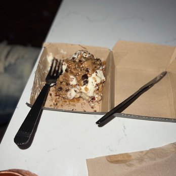 Cinnaholic - Brownie cheesecake cinnamon roll with pecans and cookie dough added - Desserts Near Me - Atlanta, Georgia Cinnaholic - Brownie cheesecake cinnamon roll with pecans and cookie dough added - Desserts Near Me - Atlanta, Georgia