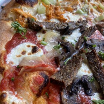 Screaming Banshee Pizza - Half spicy mutha chicken half screaming banshee- the chicken one was 10/10! - Pizza Near Me - Bisbee, Arizona