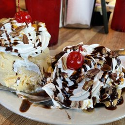 two desserts on a white plate two desserts on a white plate
