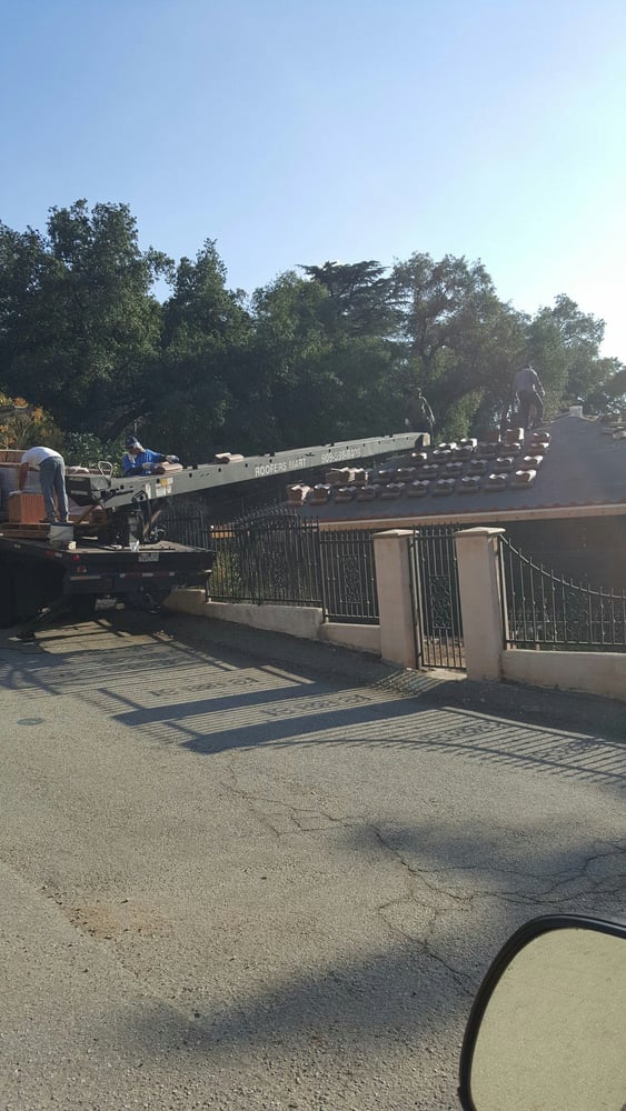 Slide of Advanced Roofing & Sons