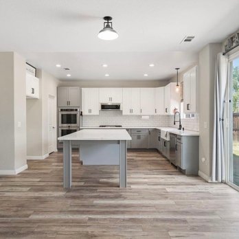 Seos Construction - a kitchen with a large island - General Contractors Near Me Seos Construction - a kitchen with a large island - General Contractors Near Me