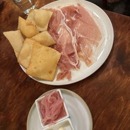 Affettati misti- fried bread and prosciutto and blue cheese