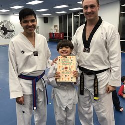 World Class Tae Kwon Do - The birthday boy with our two awesome instructors!