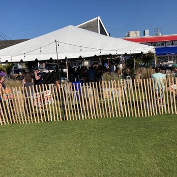 Ship Bottom Brewery - a crowd of people sitting under a tent - Breweries Near Me - Beach Haven, New Jersey