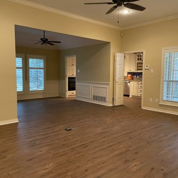 Design Floors - an empty living room with a ceiling fan - Flooring Near Me - Lewisville, Texas Design Floors - an empty living room with a ceiling fan - Flooring Near Me - Lewisville, Texas