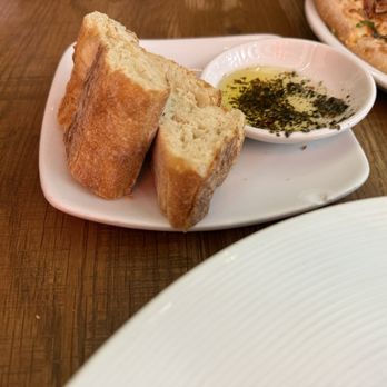 California Pizza Kitchen - Complimentary bread w/olive oil with yummy herbs. Tasty! - Pizza Near Me - Las Vegas, Nevada California Pizza Kitchen - Complimentary bread w/olive oil with yummy herbs. Tasty! - Pizza Near Me - Las Vegas, Nevada