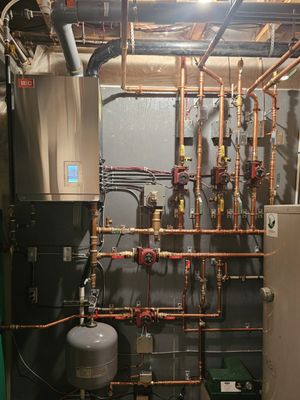 Boiler Replacement/System Upgrade - Customer was having trouble with an older Viessman unit, and after multiple service calls and insufficient heat to certain areas it was decided to have old unit replaced and piping repaired. New header and zone control, new balancing headers to achieve better home and zone comfort. Updated controls and wiring.
If you have a boiler system and unsure how it operates or is giving you trouble, please don't hesitate to reach out. We would be happy to assist. Boiler Replacement/System Upgrade - Customer was having trouble with an older Viessman unit, and after multiple service calls and insufficient heat to certain areas it was decided to have old unit replaced and piping repaired. New header and zone control, new balancing headers to achieve better home and zone comfort. Updated controls and wiring.
If you have a boiler system and unsure how it operates or is giving you trouble, please don't hesitate to reach out. We would be happy to assist.