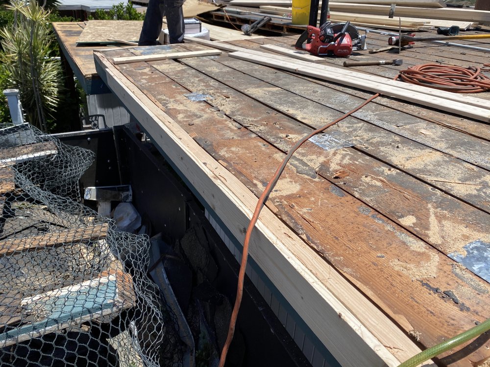 Slide of Valentine Roofing