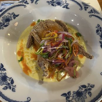 Odd Duck - Fried quail, chorizo boudin, creamed corn, arbol hot sauce, pickled peppers - American Near Me - Austin, Texas Odd Duck - Fried quail, chorizo boudin, creamed corn, arbol hot sauce, pickled peppers - American Near Me - Austin, Texas