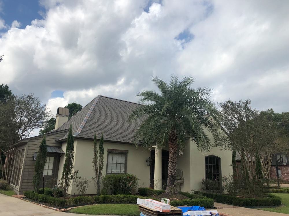 Slide of Songy's Roofing & Contractors