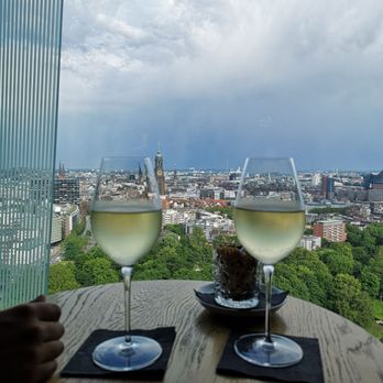 Clouds - Bar // Glasses of white wine (Sauvignon from New Zealand) - German Near Me - Hamburg, HH Clouds - Bar // Glasses of white wine (Sauvignon from New Zealand) - German Near Me - Hamburg, HH