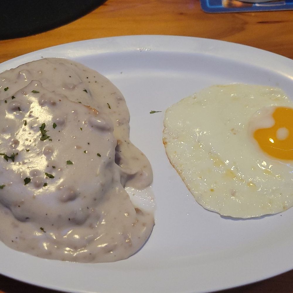 The Viking Lounge - Half Order Biscuits and Gravy with a Sunnyside up egg - Lounges Near Me - Lacey, Washington
