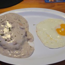 The Viking Lounge - Half Order Biscuits and Gravy with a Sunnyside up egg