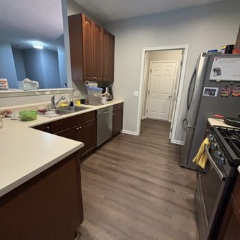 R&S Painting - Remodeling - a kitchen with a refrigerator, stove, sink, and dishwasher - Painters Near Me R&S Painting - Remodeling - a kitchen with a refrigerator, stove, sink, and dishwasher - Painters Near Me