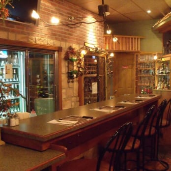 Restaurant Demers - a long bar with chairs - Pizza Near Me - Sherbrooke, Quebec Restaurant Demers - a long bar with chairs - Pizza Near Me - Sherbrooke, Quebec