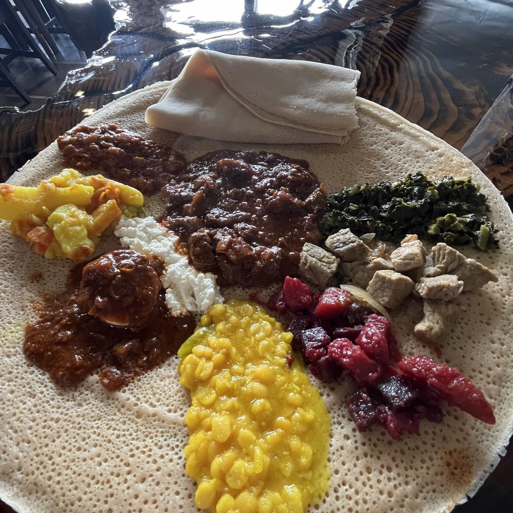 Oromian Restaurant - Ultimate "individual" platter is a misnomer. Bring some home or suffer wonderfully from an overfull stomach. - Ethiopian Near Me - Salt Lake City, Utah Oromian Restaurant - Ultimate "individual" platter is a misnomer. Bring some home or suffer wonderfully from an overfull stomach. - Ethiopian Near Me - Salt Lake City, Utah