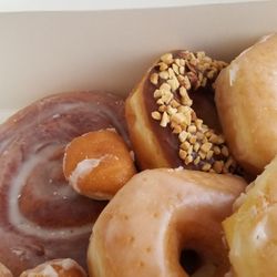 Shin's Donuts - Cinnamon roll with all kinds of soft donut goodness here! Even the peanuts on the chocolate with peanuts tasted rather fresh!