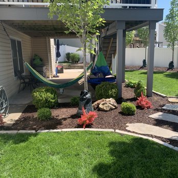 One Vision Landscape and Snow Management - hammock in the yard - Landscaping Near Me One Vision Landscape and Snow Management - hammock in the yard - Landscaping Near Me