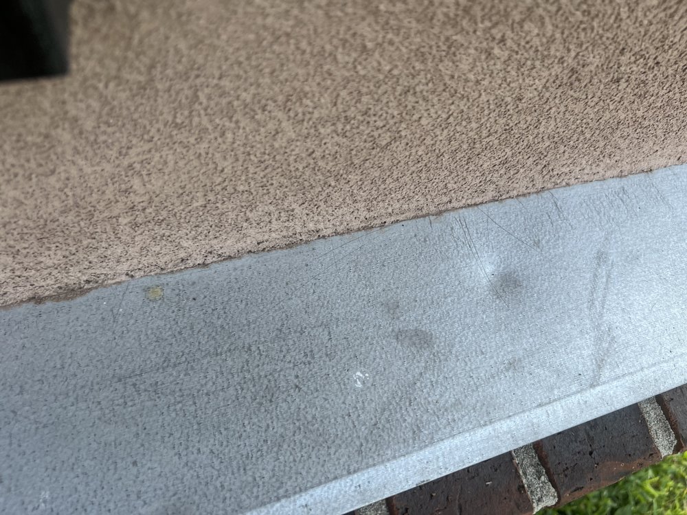 Slide of All In One Exterior & Construction