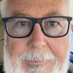 Clarin Eye Care Center - Emporio Armani blue frames with light blue permanent tint on anti-glare progressive lenses